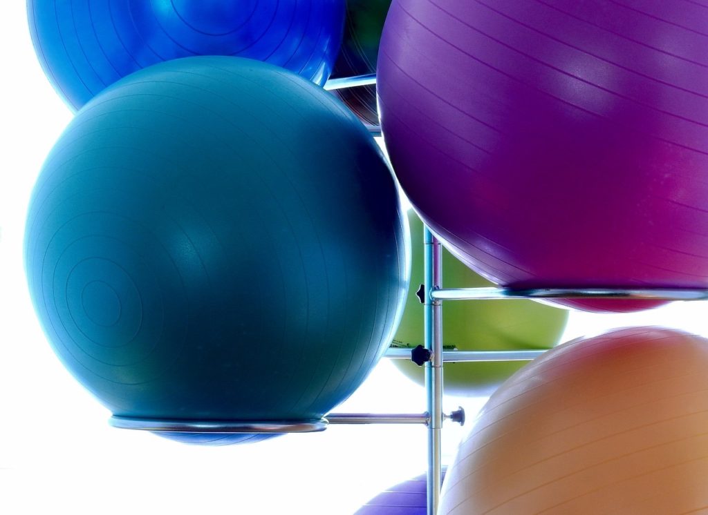 Can Sitting On An Exercise Ball Save You From Back Pain At Work?